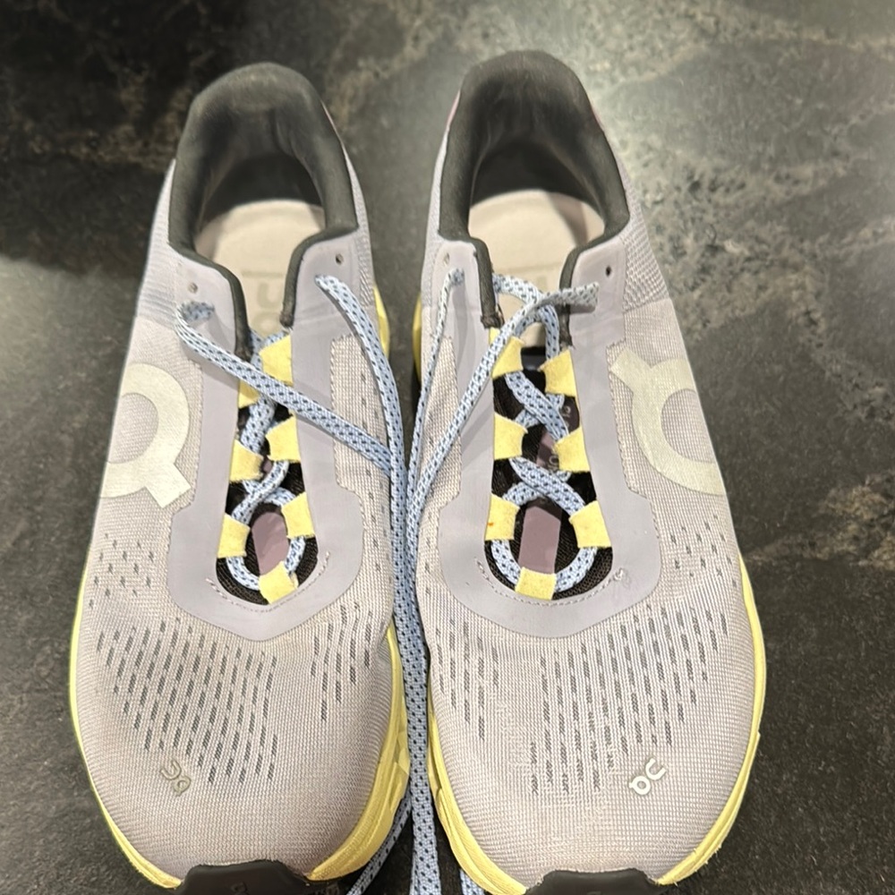 On Running Light Gray and Yellow Sneakers